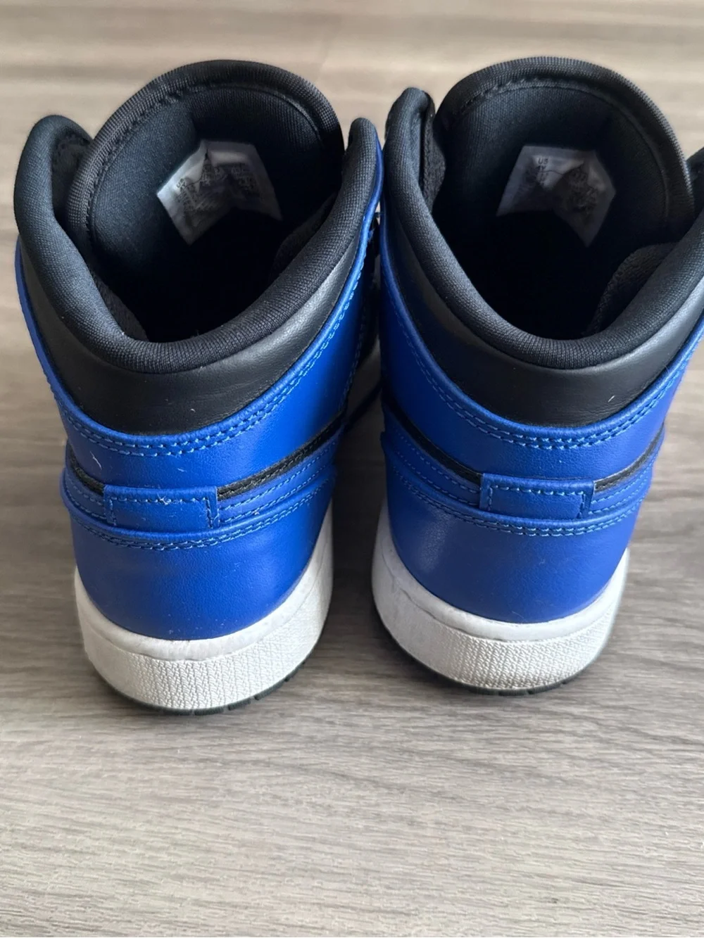 Nike Black and White Youth Sneakers with Size Tag